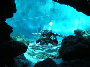 cave diver doing signs