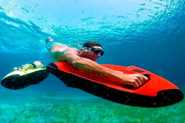 Scuba Diving with an underwater scooter