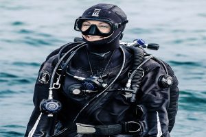 Woman wearing a dry diving suit