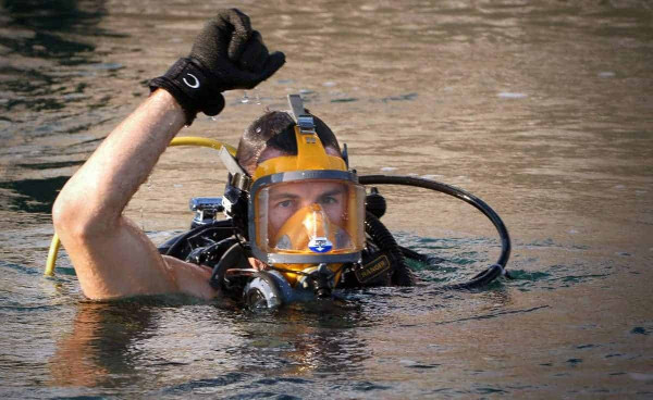 Scuba diver wearing a full-face mask