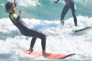 Surfer practicing his balance