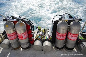 Diving tanks filled with trimix; used for technical diving