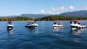 boats and people from costa rica dive and surf