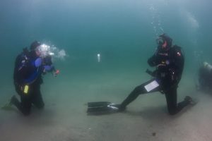 diving records - Cristi Quill Sets walking at the bottom of the sea