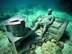 underwater museum man watching tv