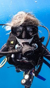 Diver closer to the camera during dive tour