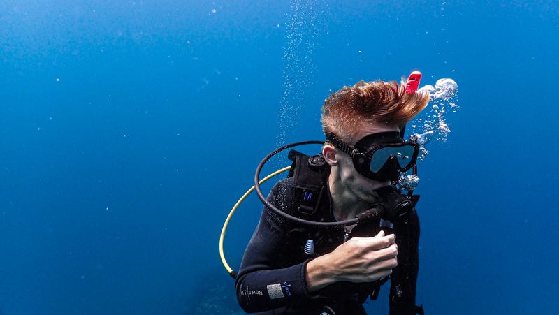 Diver making signs during Diving Tour in Costa Rica Caño Island