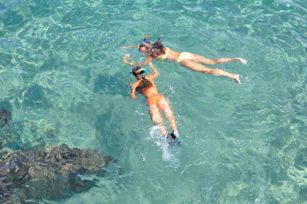 two girls snorkeling puerto viejo