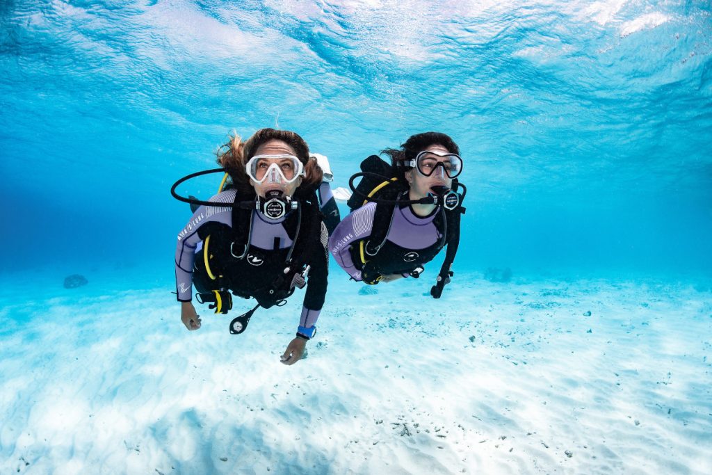 two divers exploring-diving quotes