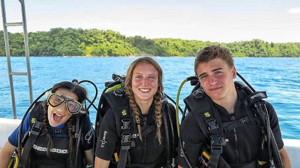 Older Kids getting ready to scuba dive