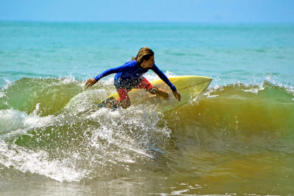 man surfing in dominical beach