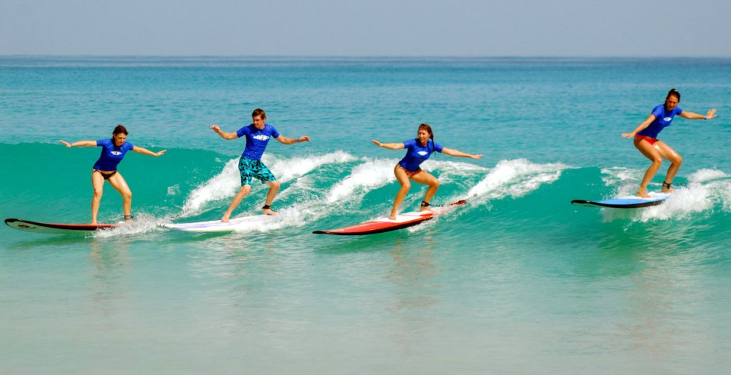 surfers practicing- surfing tip number 4- keeping their eye on the target