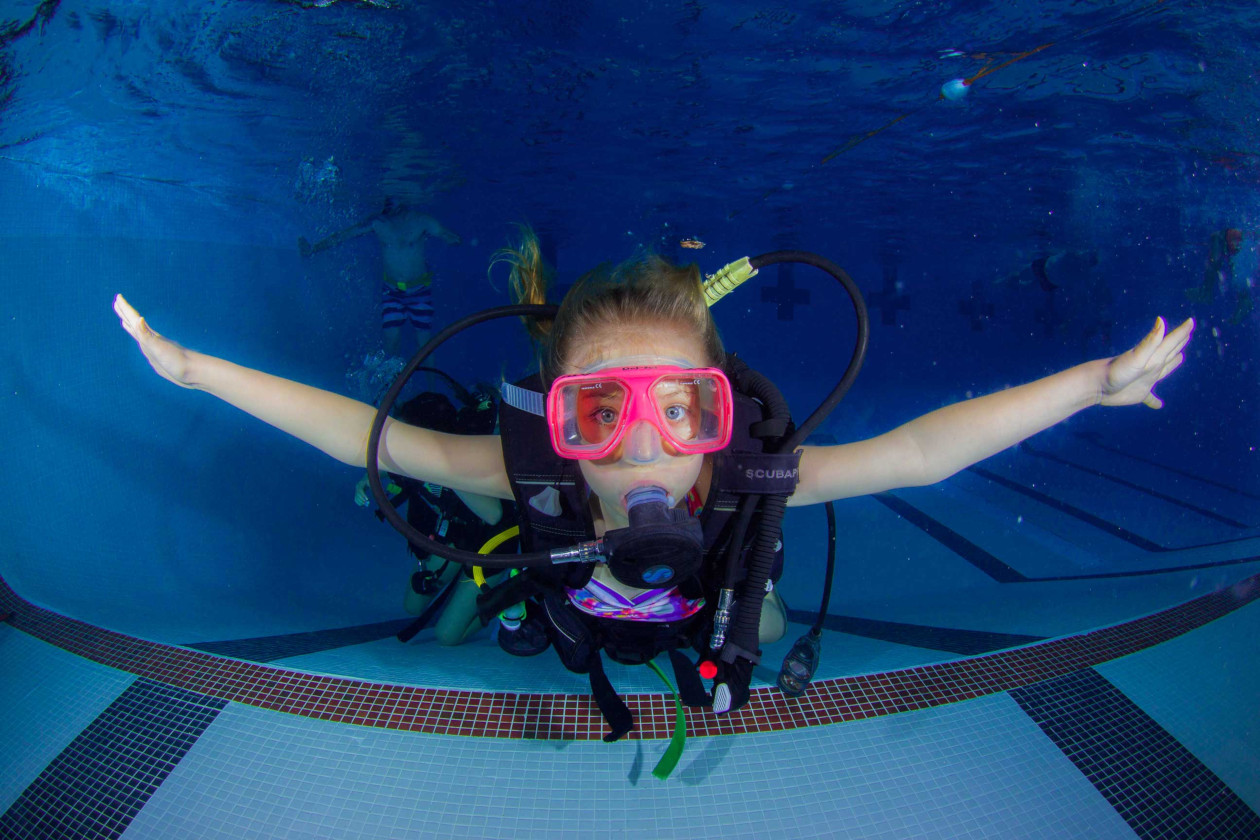 little girl diving